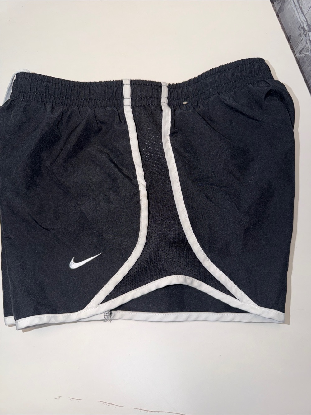 Girls Nike Black Shorts with White Trim and Swoosh